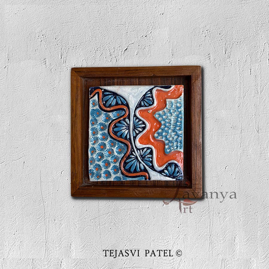 Discover handmade ceramic wall sculpture by Tejasvi Patel at Lavanya Art Studio. Indian art with textured art, framed in teak wood for elegant modern decor.