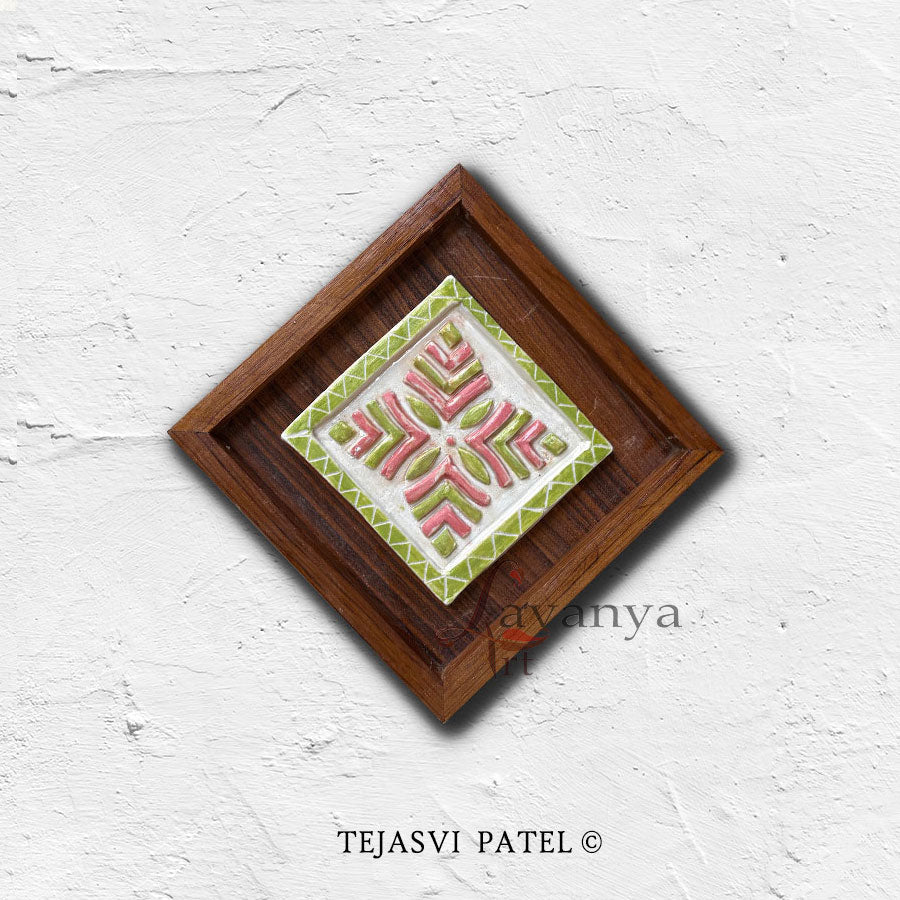Discover handmade ceramic wall sculptures by Tejasvi Patel at Lavanya Art Studio, blending Indian art, textured art, and elegant teak wood frames.