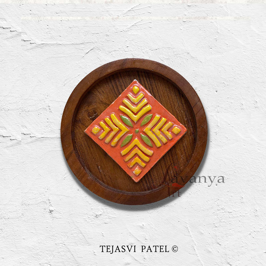 Discover handmade ceramic wall sculptures by Tejasvi Patel at Lavanya Art Studio, blending Indian art, textured art, and elegant teak wood frames.